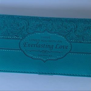Teal Christian art checkbook cover